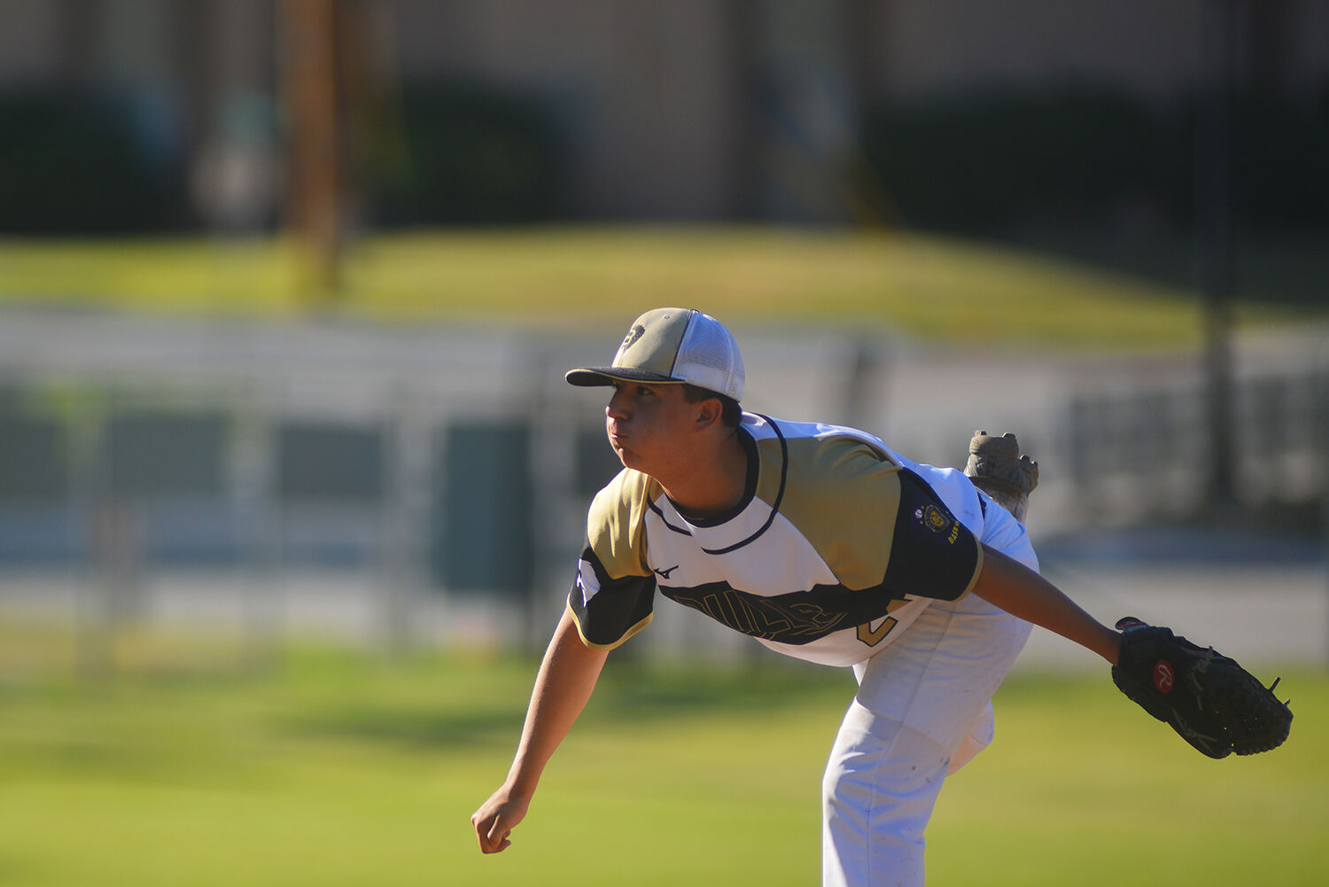 Terrance Neill watches his pitch move over the plate